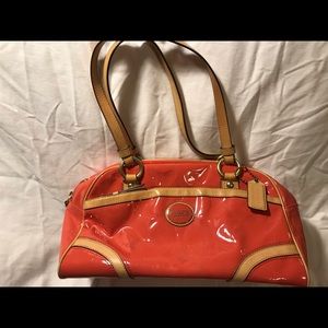Patent leather corral-coloured Coach purse